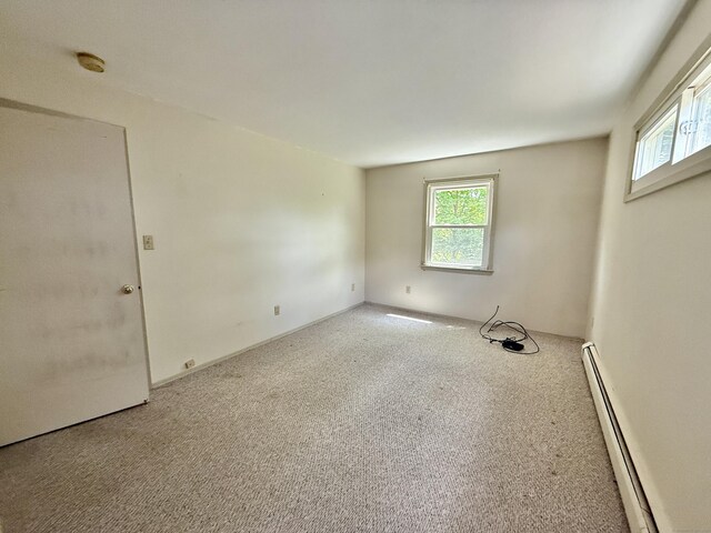 14 Arrowhead Way Apt C6, Woodbury, CT 06798 - carpeted spare room with baseboard heating and a smoke detector