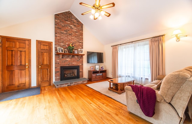 258 New Cheshire Rd, Wallingford, CT 06492 - living room with a ceiling fan, high vaulted ceiling, wood finished floors, and a fireplace