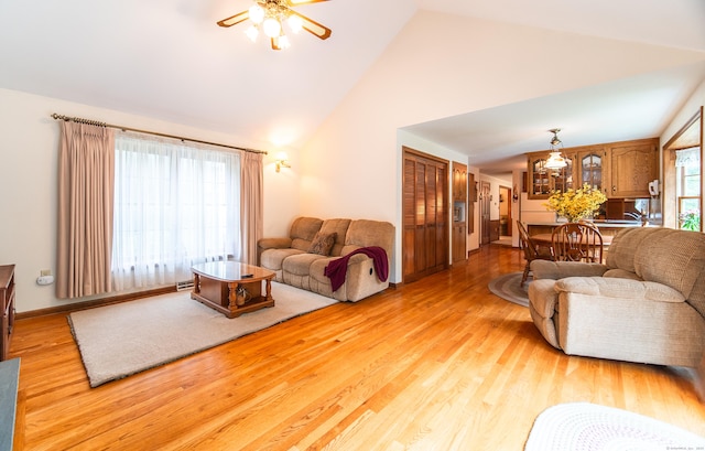 258 New Cheshire Rd, Wallingford, CT 06492 - living room with a ceiling fan, light wood-style floors, and high vaulted ceiling