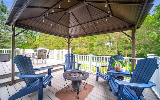 258 New Cheshire Rd, Wallingford, CT 06492 - wooden deck with an outdoor fire pit, a gazebo, and outdoor dining area