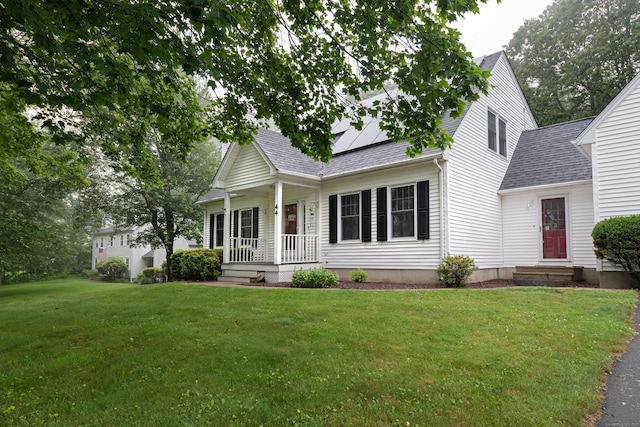 44 Richard Ave, Wolcott, CT 06716 - view of front of house with covered porch, a front yard, and roof with shingles