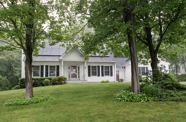 44 Richard Ave, Wolcott, CT 06716 - view of front of property featuring a front lawn and roof with shingles