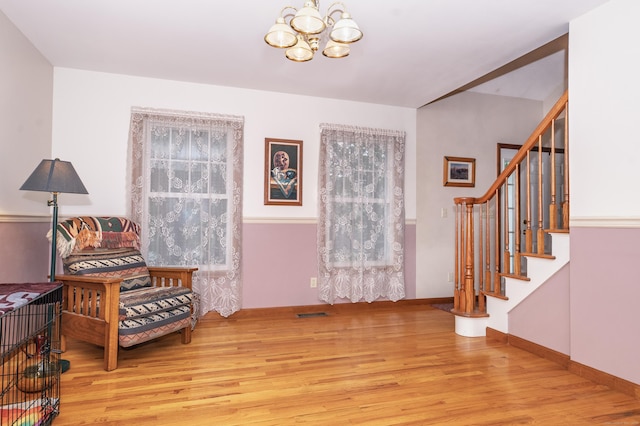 44 Richard Ave, Wolcott, CT 06716 - entryway featuring wood finished floors, a chandelier, and stairway