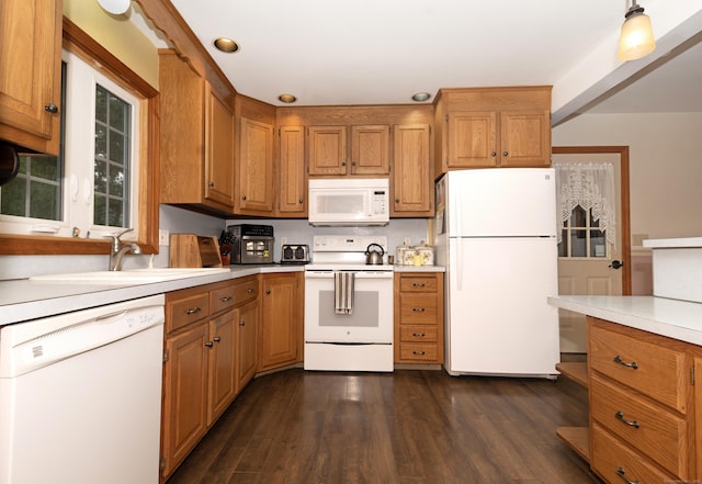 44 Richard Ave, Wolcott, CT 06716 - kitchen featuring white appliances, light countertops, brown cabinetry, and recessed lighting