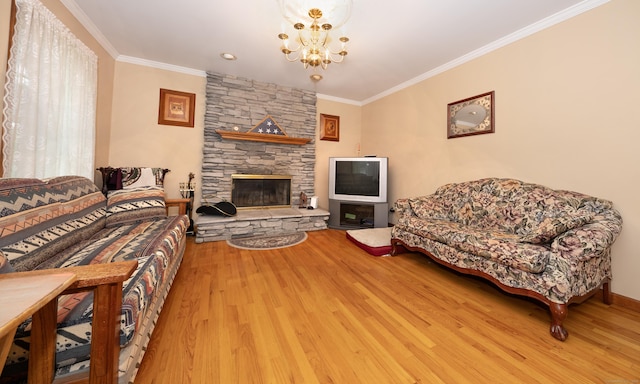 44 Richard Ave, Wolcott, CT 06716 - living room with a stone fireplace, wood finished floors, crown molding, and a chandelier