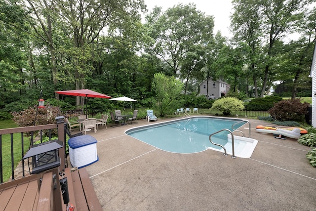 44 Richard Ave, Wolcott, CT 06716 - view of pool featuring a patio, outdoor dining space, and view of wooded area