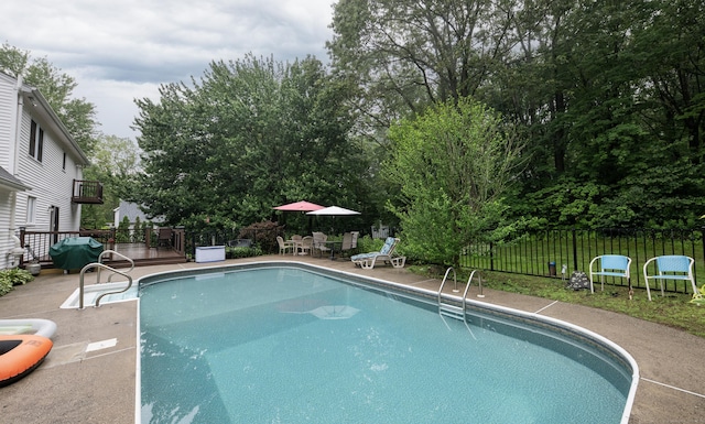 44 Richard Ave, Wolcott, CT 06716 - view of swimming pool with area for grilling, a wooden deck, and a patio