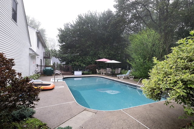 44 Richard Ave, Wolcott, CT 06716 - view of swimming pool featuring a patio and a deck