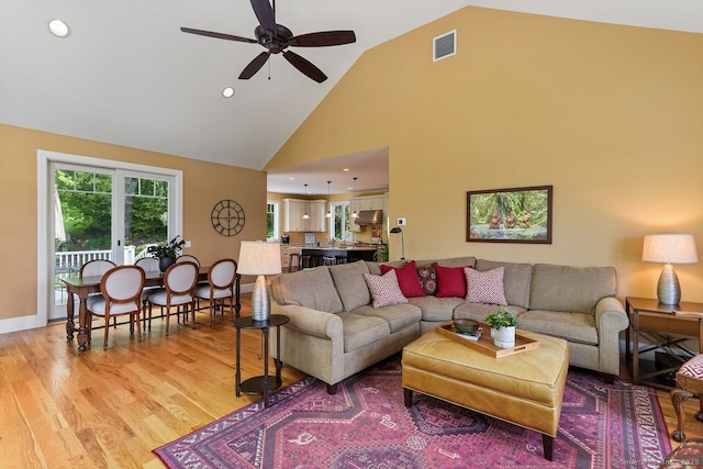 8 Meadowview Dr, Brookfield, CT 06804 - living room featuring high vaulted ceiling, a ceiling fan, light wood-style floors, and recessed lighting