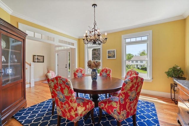 8 Meadowview Dr, Brookfield, CT 06804 - dining space featuring light wood-style flooring, crown molding, and a chandelier