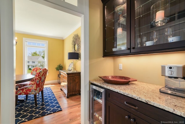 8 Meadowview Dr, Brookfield, CT 06804 - indoor dry bar featuring wine cooler, ornamental molding, and light wood-type flooring