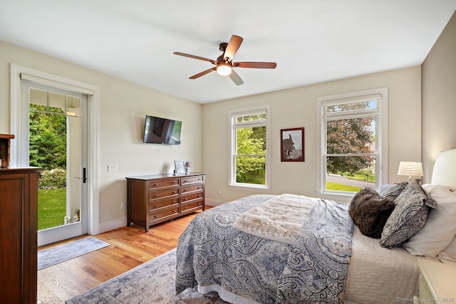8 Meadowview Dr, Brookfield, CT 06804 - bedroom with access to outside, multiple windows, light wood-style floors, and ceiling fan