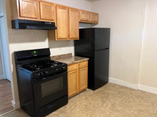 54 Morningside Ave, Waterbury, CT 06708 - kitchen featuring black appliances, extractor fan, and baseboards
