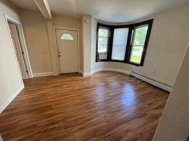 54 Morningside Ave, Waterbury, CT 06708 - foyer featuring a baseboard heating unit, wood finished floors, cooling unit, and baseboards