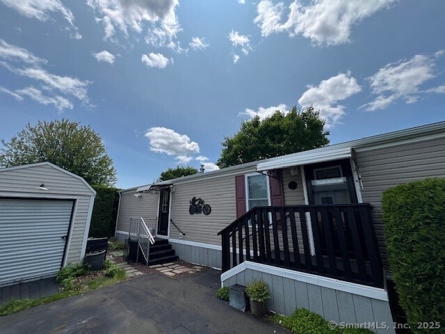 24 Ella Cir, Milford, CT 06460 - manufactured / mobile home with an outdoor structure