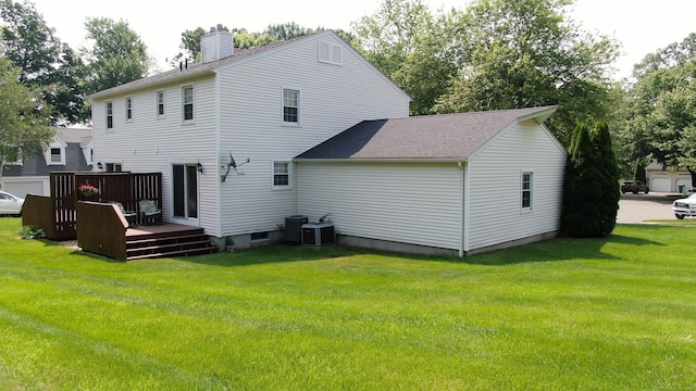 55 Addison Pond Rd Unit 55, Glastonbury, CT 06033 - rear view of property featuring a wooden deck, a chimney, a yard, and a shingled roof