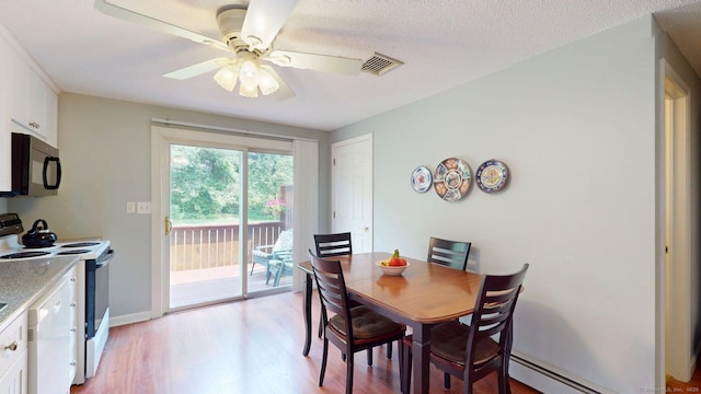 55 Addison Pond Rd Unit 55, Glastonbury, CT 06033 - dining area featuring light wood-style floors, a baseboard radiator, and ceiling fan