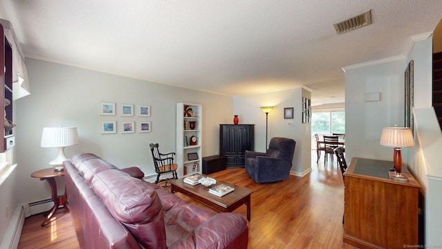 55 Addison Pond Rd Unit 55, Glastonbury, CT 06033 - living room featuring light wood-style floors, crown molding, and baseboard heating