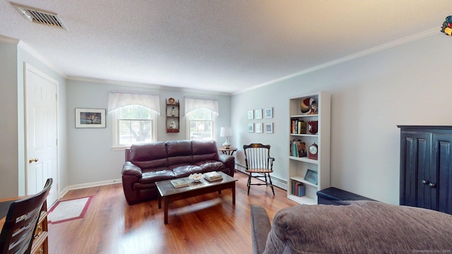 55 Addison Pond Rd Unit 55, Glastonbury, CT 06033 - living area with ornamental molding, wood finished floors, and a textured ceiling