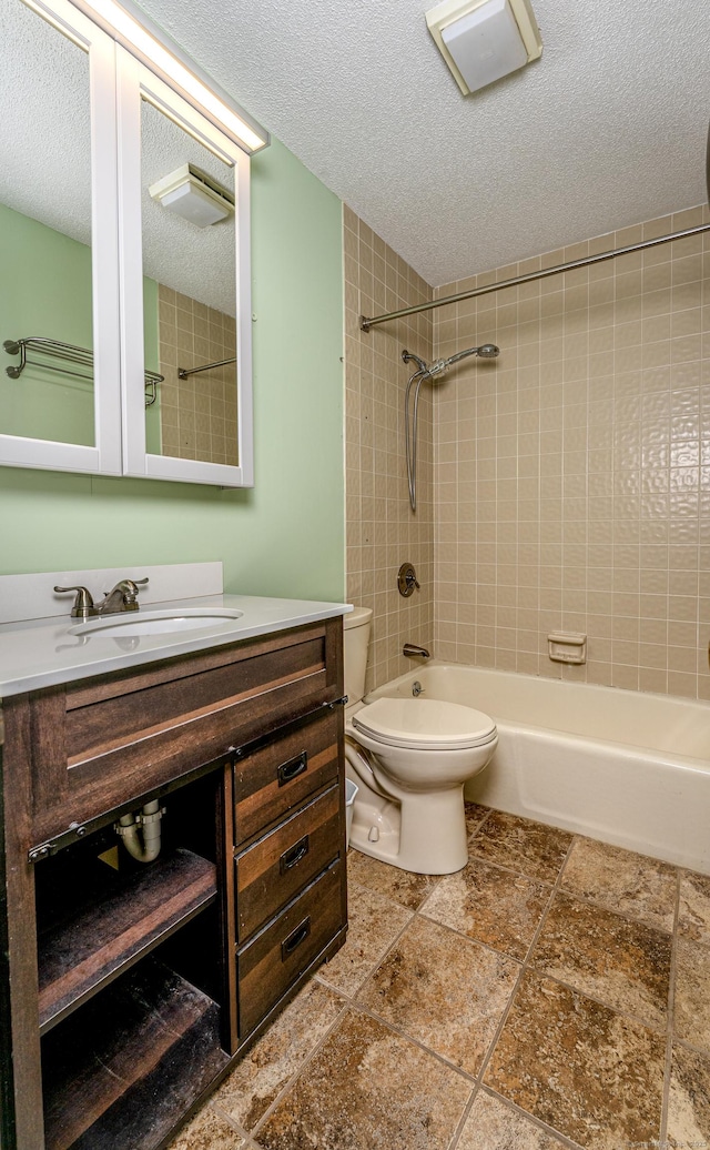 2 Mansfield Grove Rd Apt 374, East Haven, CT 06512 - bathroom featuring toilet, vanity, a textured ceiling, and  shower combination