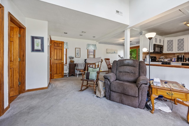 134 Mansfield Grove Rd, East Haven, CT 06512 - living area featuring light colored carpet and baseboards
