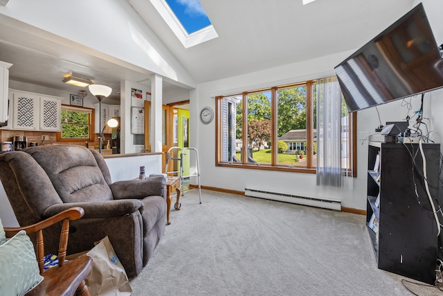 134 Mansfield Grove Rd, East Haven, CT 06512 - carpeted living area featuring a baseboard radiator, lofted ceiling, a skylight, and baseboards