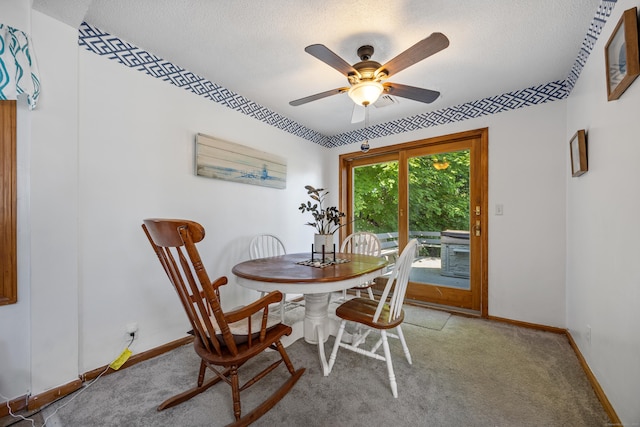 134 Mansfield Grove Rd, East Haven, CT 06512 - dining area featuring a textured ceiling, ceiling fan, baseboards, and carpet