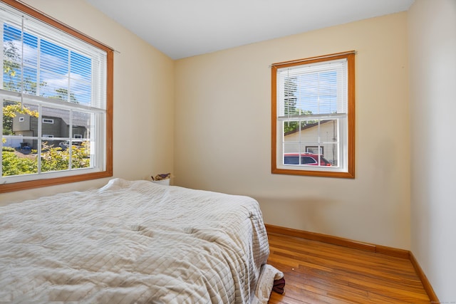 134 Mansfield Grove Rd, East Haven, CT 06512 - bedroom with wood-type flooring and baseboards