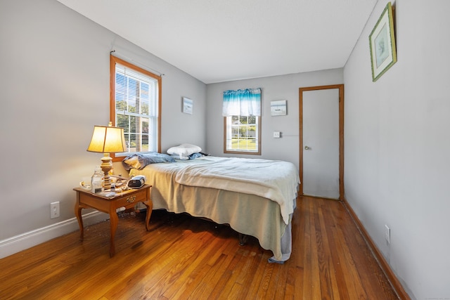 134 Mansfield Grove Rd, East Haven, CT 06512 - bedroom with light wood-style flooring and baseboards