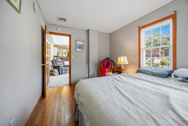 134 Mansfield Grove Rd, East Haven, CT 06512 - bedroom with hardwood / wood-style floors and baseboards
