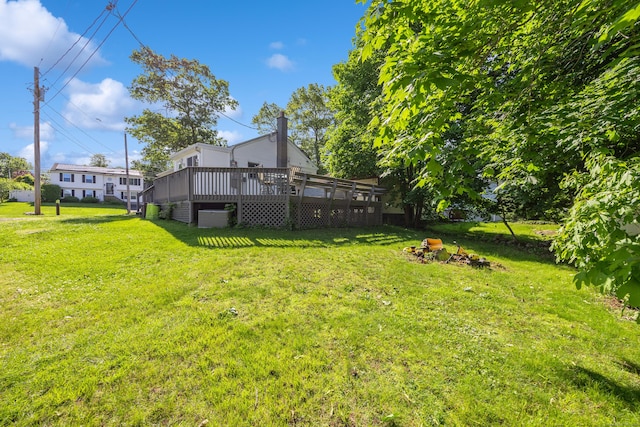 134 Mansfield Grove Rd, East Haven, CT 06512 - view of green lawn featuring a wooden deck
