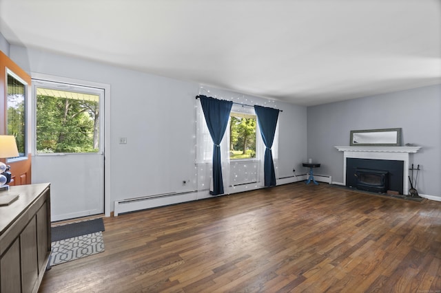 64 Obed Hts, Old Saybrook, CT 06475 - unfurnished living room with healthy amount of natural light, wood finished floors, and baseboard heating