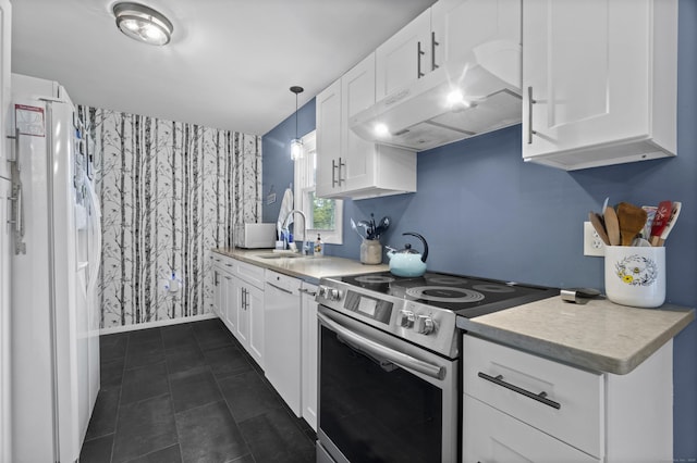 64 Obed Hts, Old Saybrook, CT 06475 - kitchen featuring white appliances, under cabinet range hood, wallpapered walls, a sink, and light countertops
