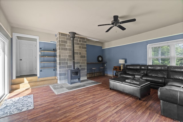 64 Obed Hts, Old Saybrook, CT 06475 - living area featuring a wood stove, ceiling fan, and wood finished floors