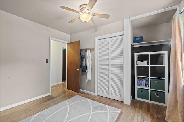 64 Obed Hts, Old Saybrook, CT 06475 - unfurnished bedroom with wood finished floors, a closet, baseboards, and ceiling fan