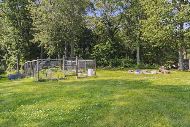 64 Obed Hts, Old Saybrook, CT 06475 - view of green lawn featuring a garden