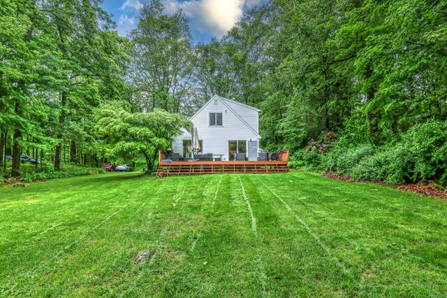 225 Rocky Mountain Rd, Southbury, CT 06488 - view of green lawn with a wooden deck