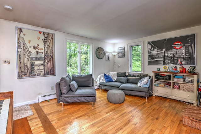 225 Rocky Mountain Rd, Southbury, CT 06488 - living area featuring wood-type flooring, baseboard heating, and healthy amount of natural light