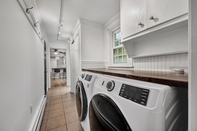 206 Ludlow Rd, Manchester, CT 06040 - laundry room featuring washing machine and dryer, cabinet space, a baseboard radiator, tile patterned flooring, and track lighting