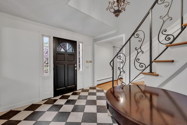 206 Ludlow Rd, Manchester, CT 06040 - foyer entrance featuring baseboard heating, stairway, ornamental molding, a chandelier, and dark floors