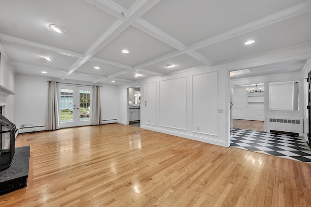 206 Ludlow Rd, Manchester, CT 06040 - unfurnished living room featuring radiator, a chandelier, light wood-style flooring, a baseboard heating unit, and coffered ceiling