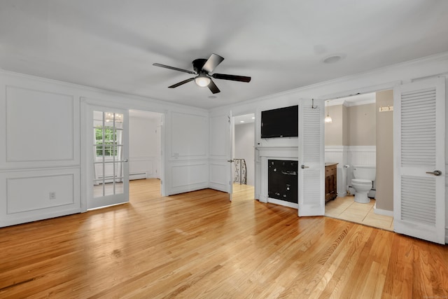 206 Ludlow Rd, Manchester, CT 06040 - unfurnished living room with ceiling fan, a decorative wall, crown molding, a fireplace, and light wood-style flooring