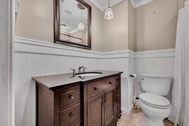 206 Ludlow Rd, Manchester, CT 06040 - bathroom with wainscoting, vanity, tile patterned floors, and ornamental molding