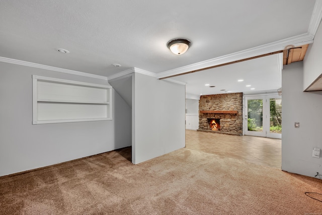 206 Ludlow Rd, Manchester, CT 06040 - unfurnished living room with carpet floors, a stone fireplace, and crown molding