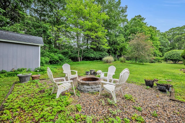 206 Ludlow Rd, Manchester, CT 06040 - view of grassy yard featuring a fire pit and a shed