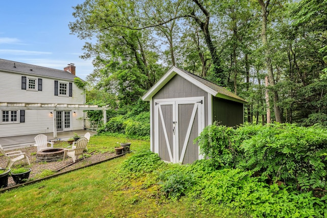 206 Ludlow Rd, Manchester, CT 06040 - view of shed with an outdoor fire pit and a pergola
