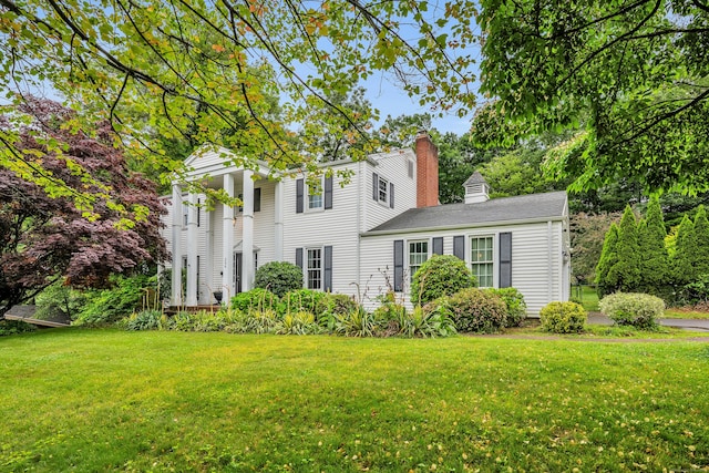 206 Ludlow Rd, Manchester, CT 06040 - view of front of house with a chimney and a front yard