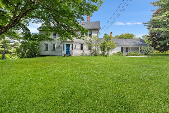 27 Tobey Hill Rd, North Canaan, CT 06018 - view of front of house featuring a chimney and a front lawn