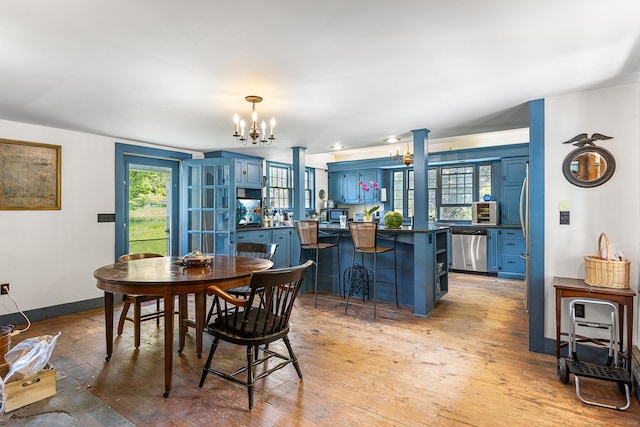 27 Tobey Hill Rd, North Canaan, CT 06018 - dining room featuring a chandelier and light wood-style floors