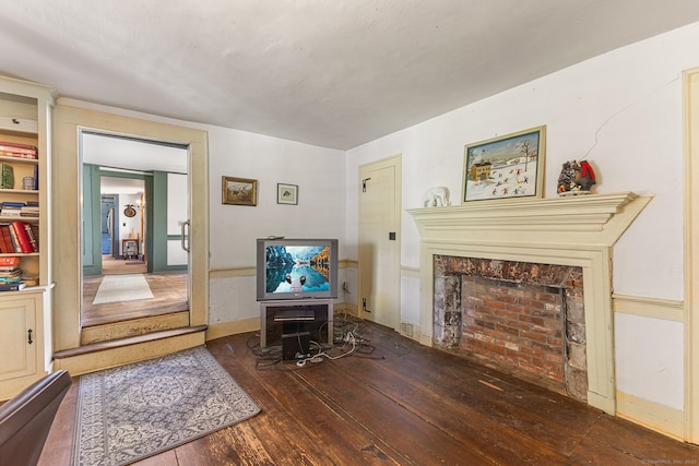 27 Tobey Hill Rd, North Canaan, CT 06018 - living area featuring hardwood / wood-style flooring and a tiled fireplace
